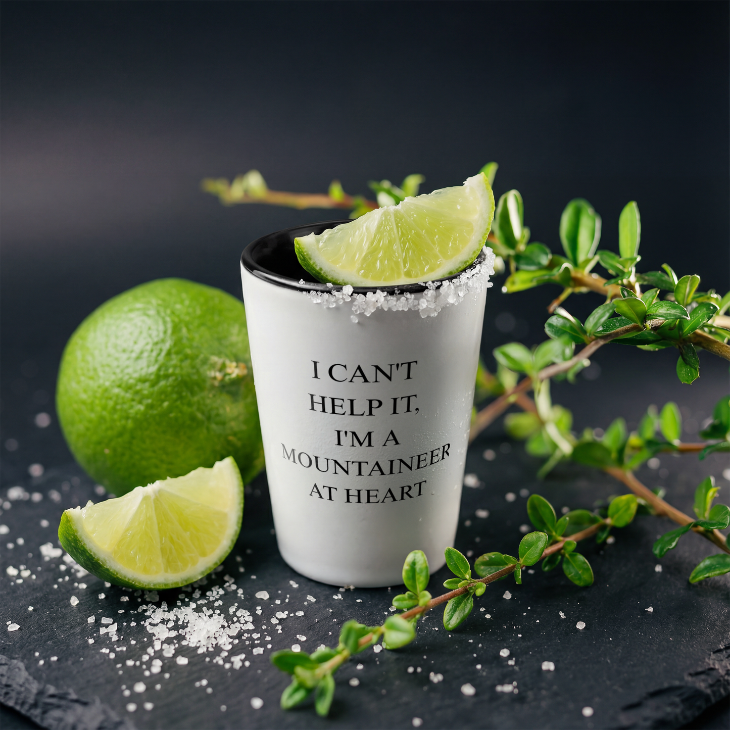 WV_Mountaineer_at_heart__shot_glass_Black_Lifestyle_02_Lime_Salt_Mockup.png_15532706