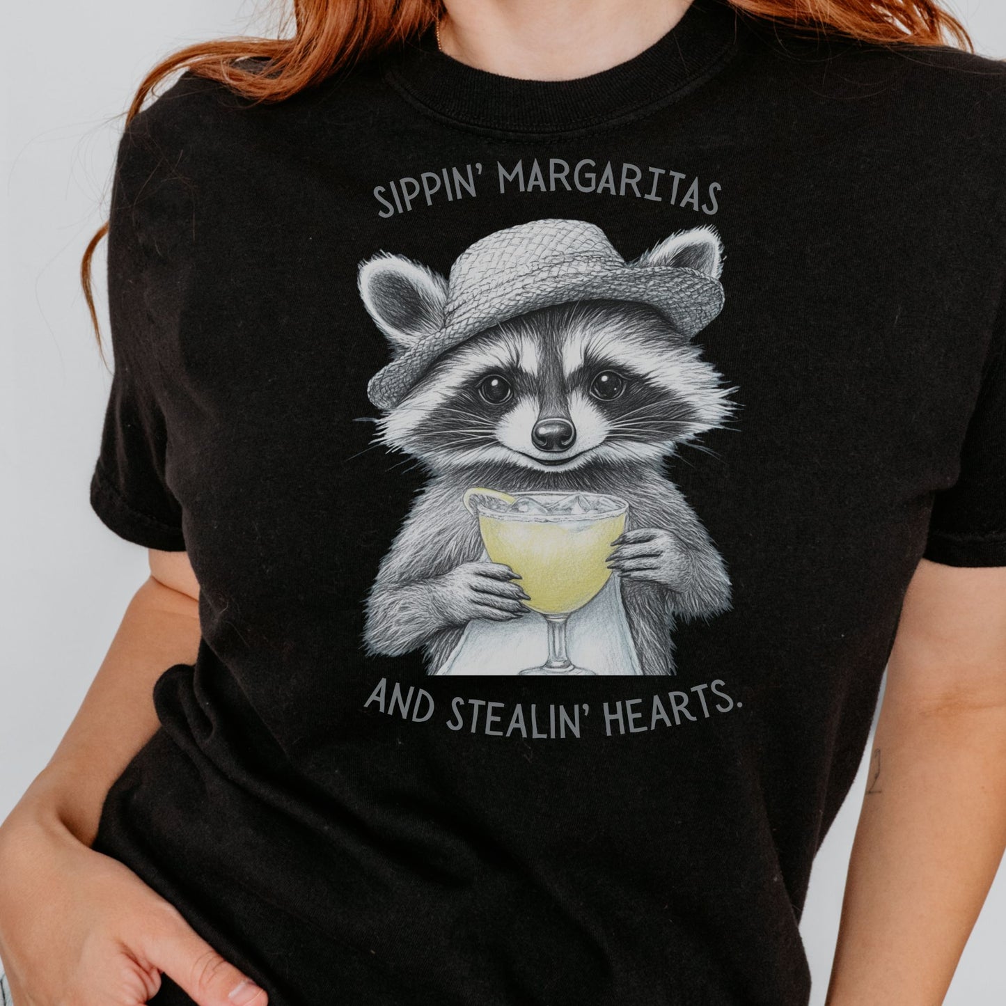 Raccoon Sipping A Margarita Beach T-Shirt